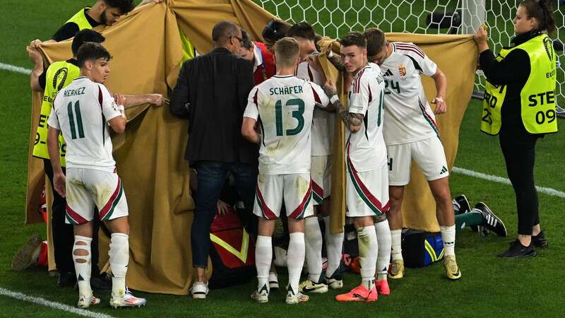 Barnabas Varga was shielded by sheets to preserve his privacy after being injured (Image: AFP via Getty Images)