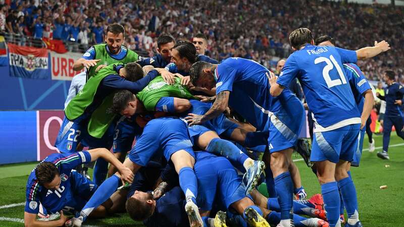 Mattia Zaccagni of Italy celebrates scoring the late equaliser