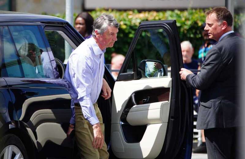 Sir Timothy waved to Royal well-wishers