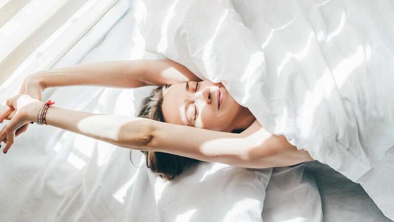 There are changes you can make to help you sleep in the heat (Image: Getty Images)