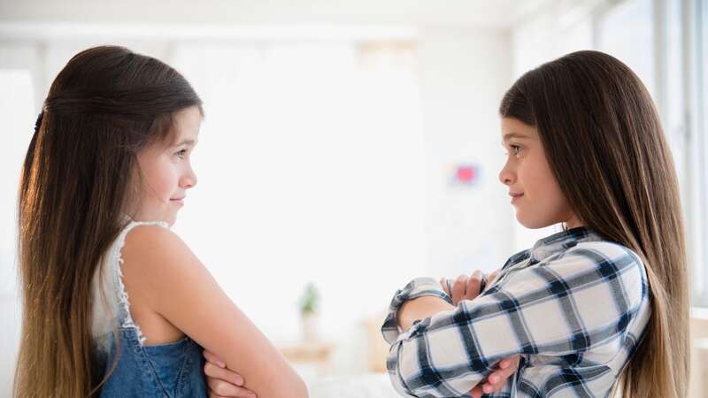 The twin girls are very different sizes (stock) (Image: Getty Images/Tetra images RF)