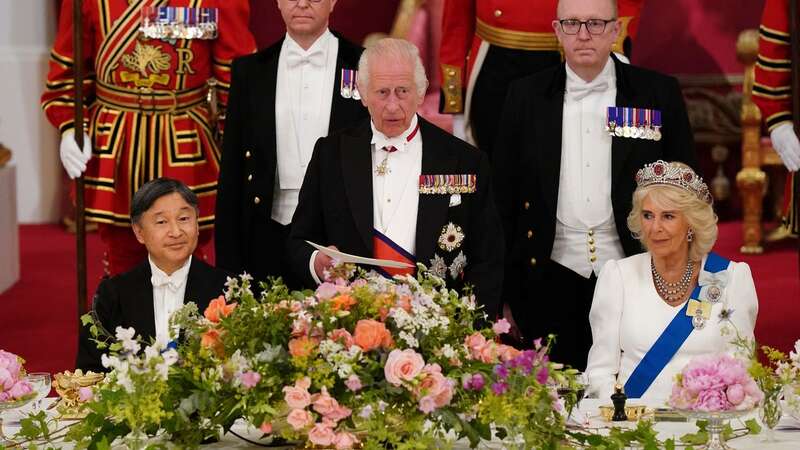 King Charles addressing guests at the State Dinner, supported by his wife Camilla (Image: Getty Images)