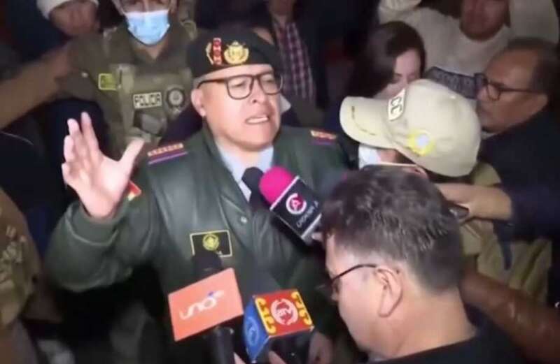 Watch the demoted army chief speaking to dozens of frenzied reporters as he was detained on suspicion of terrorism and armed uprising