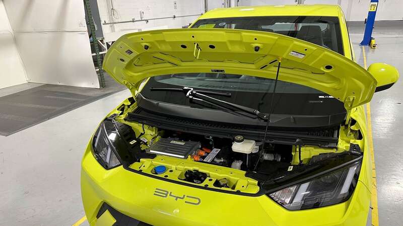 A BYD Seagull electric vehicle, with its hood open, is shown at the Caresoft Global facility in Livonia, Michigan (Image: Copyright 2024 The Associated Press. All rights reserved.)