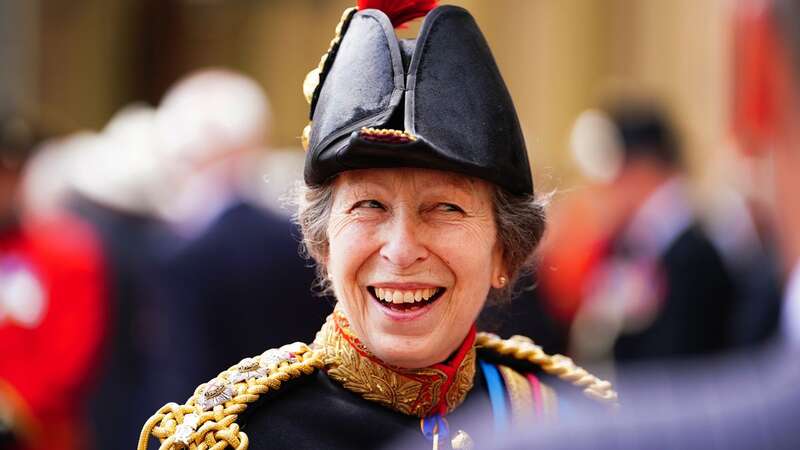 Princess Anne speaks with guests after the presentation of the new Sovereign