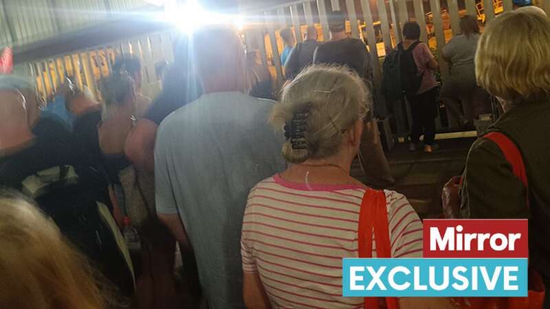 EasyJet passengers kept in a "cage" at the airport in Paphos (Image: Chris Lewis)