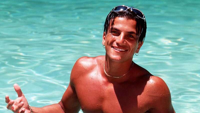 Peter Andre became famous for his rock hard abs in the 90s (Image: REX/Shutterstock)