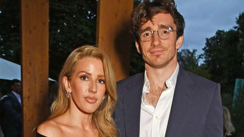 Ellie Goulding and estranged husband Caspar Jopling were snapped partying at Glastonbury