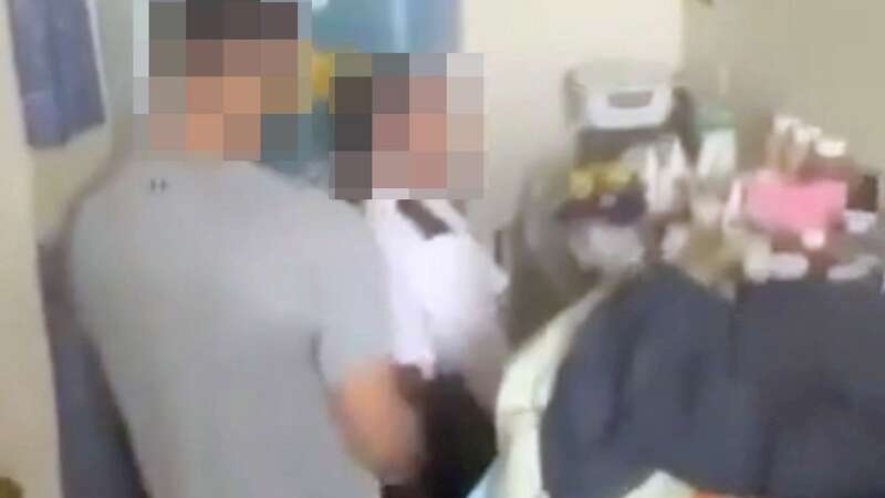 An image from the viral footage allegedly of a prison guard having sex with an inmate (Image: X)