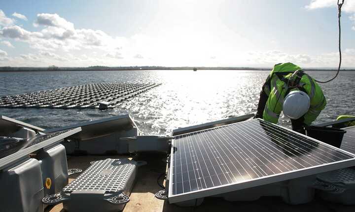 A floating solar panel array installed on a Thames Water site on London’s Queen Elizabeth II reservoir in 2016. Photograph: Martin Godwin/The Guardian