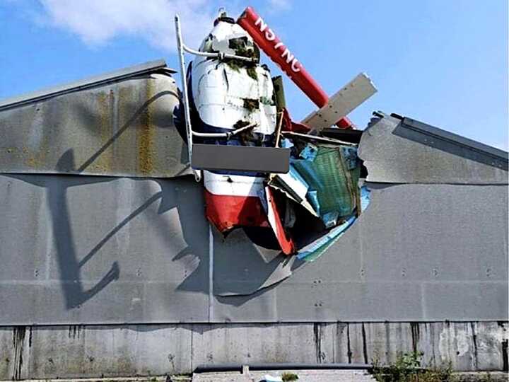 The crashed helicopter embedded in the roof of a farm building in Westmeath. Photograph: Twitter/X