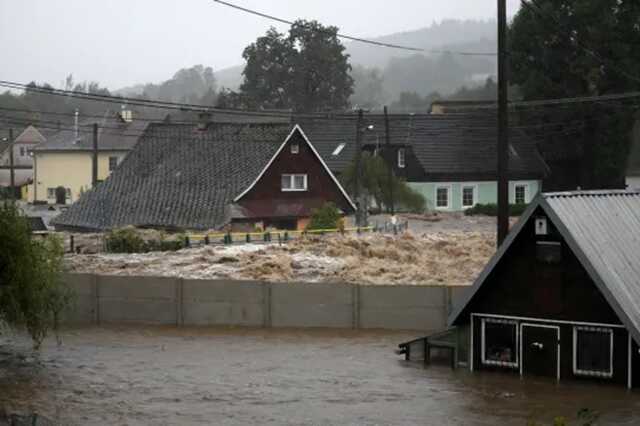 Flash floods have submerged entire floors of people’s homes (Picture: Petr David Josek/AP)