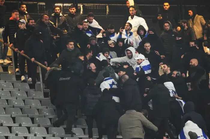 Fans argue on stands during the UEFA Nations League soccer match between France and Israel at the Stade de France stadium in Saint-Denis (Picture: AP)