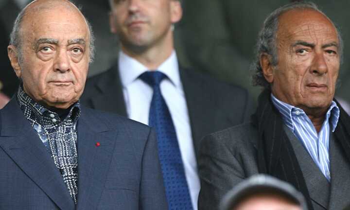 Mohamed al Fayed (left) with his brother Salah al Fayed (right) in the stands at a Fulham match in 2007. Pic: PA