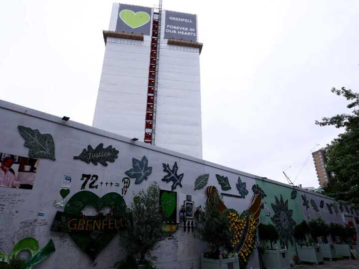 ‘A shrine and gravesite’: Families protest Grenfell Tower demolition