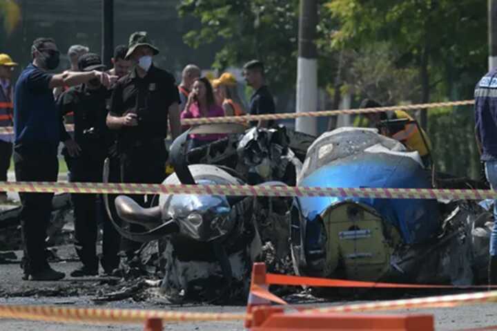 The small plane’s propeller was seen heavily damaged (Picture: AFP)