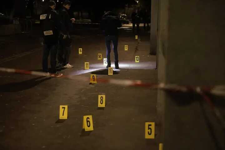 Police investigators work near the scene of an explosion at a bar where a grenade was thrown, in Grenoble. Picture: Getty