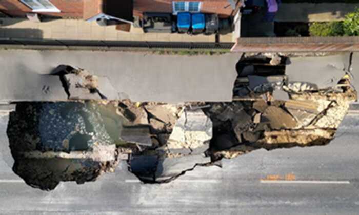 "We’re just terrified": Residents evacuate homes after sinkhole appears on Surrey high street