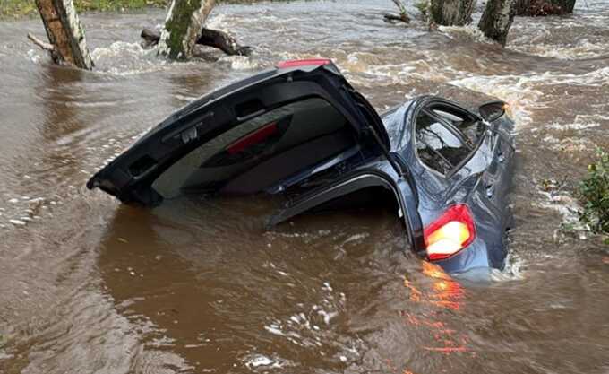 Motorists saved as Storm Chandra inundates roads and leaves vehicles stranded in increasing water levels throughout the UK