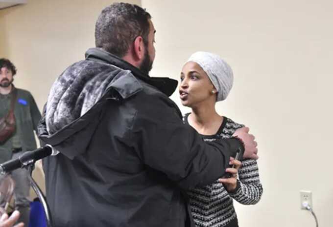 During a heated public meeting in Minnesota, Democratic congresswoman Ilhan Omar was targeted with an unidentified liquid